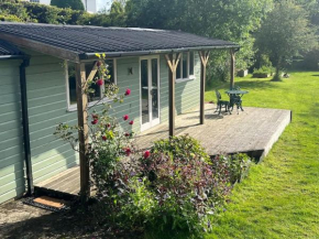 Devon country garden lodge with stunning views